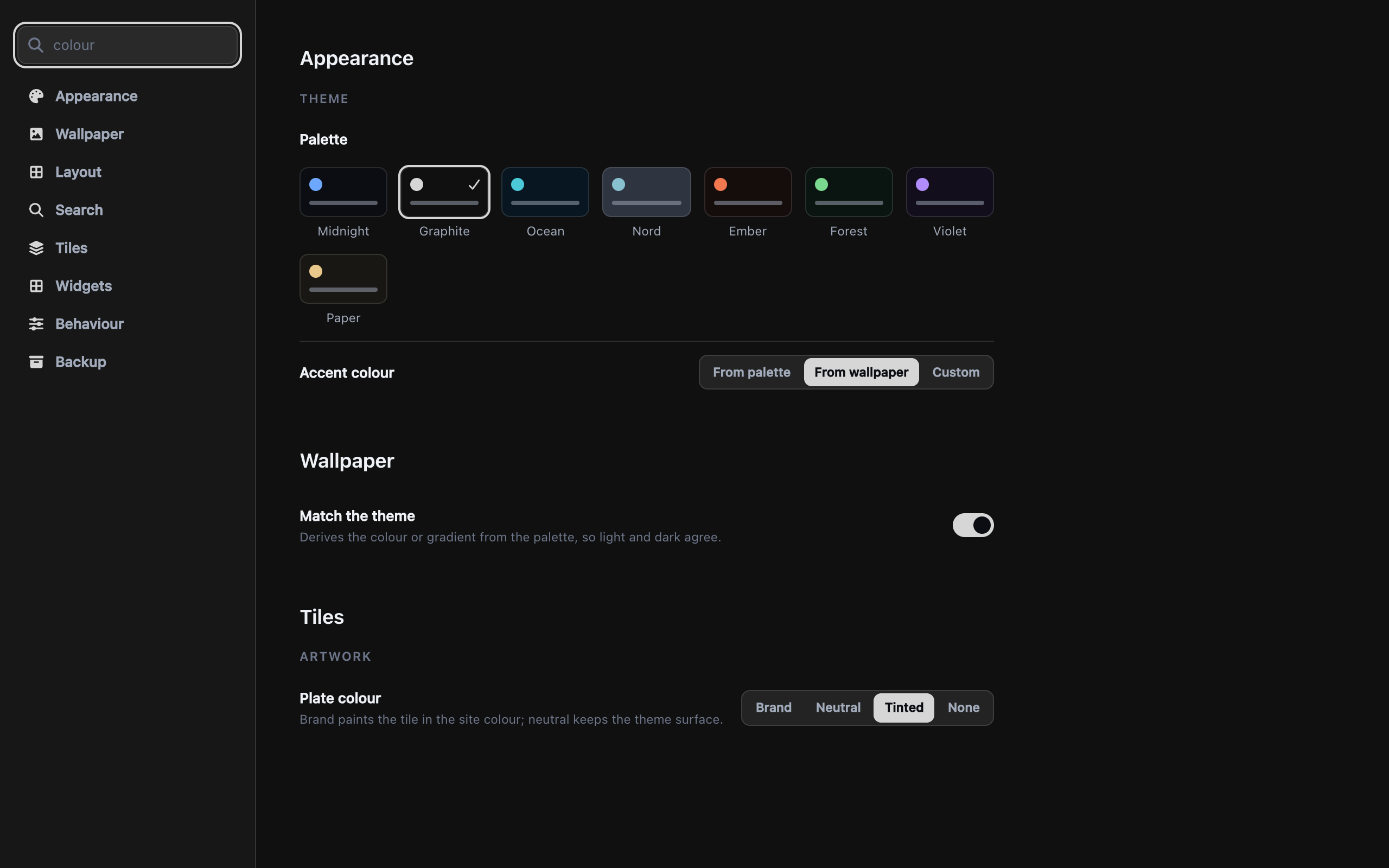 The settings page with 'colour' typed into its search box, returning results grouped under three headings at once: the eight palette swatches and the accent control under Appearance, a theme-matching toggle under Wallpaper, and the plate colour switch under Tiles.